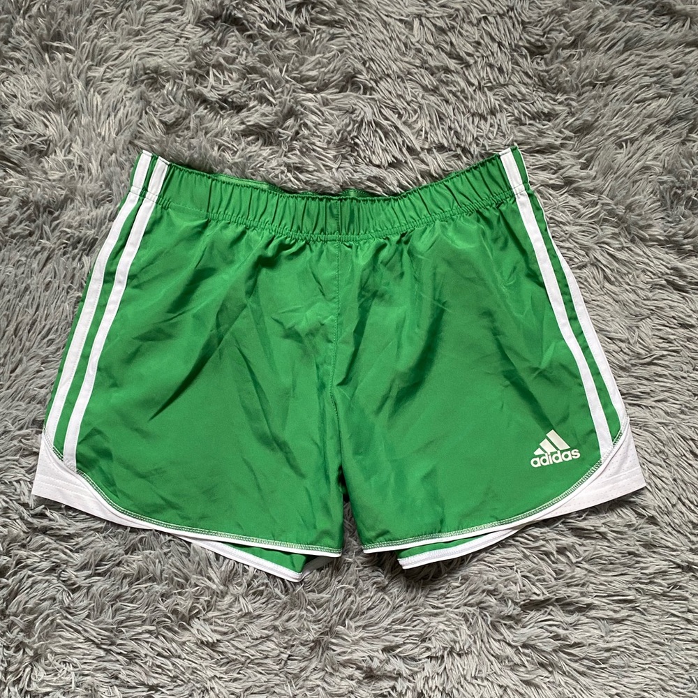 Green adidas shorts